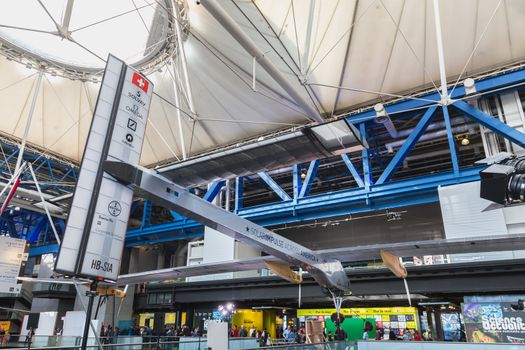 Paris, France - October 6, 2018: Exhibition of the famous Solar Impulse HB-SIA electric aircraft during the Science Fair 2018 in the hall of the City of Science and Industry