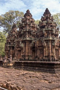 Prasats, or chapels, at the ancient Khmer temple of Banteay Srei, Angkor, Cambodia.