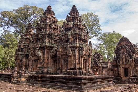 The ancient Khmer temple of Banteay Srei. Built out of carved, red sandstone in 967, Angkor, Cambodia.