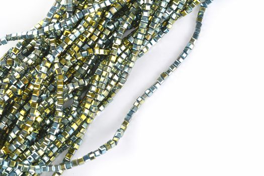 Beautiful Light green Glass Sparkle Crystal Isoalted Beads on white background. Use for diy beaded jewelry