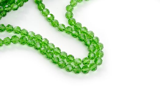 Beautiful Light green Glass Sparkle Crystal Isoalted Beads on white background. Use for diy beaded jewelry