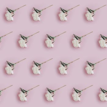 Creative layout made with white peony flowers on pink background. Flat lay. Flower composition
