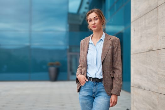 Businesswoman successful woman business person standing outdoor corporate building exterior Pensive elegance cute caucasian confidence professional business woman middle age female Bank worker