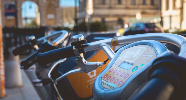 Montpellier, France - January 2, 2019: Velomagg bike sharing city bikes for rental in Montpellier. Bike sharing is a popular city transport