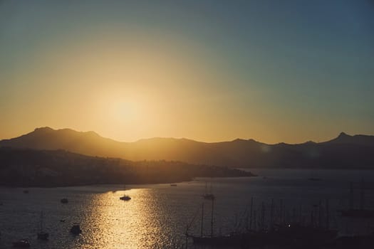 Beautiful sea view and mountains in the Mediterranean at sunset, summer vacation travel and holiday destination