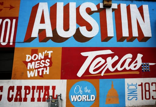 AUSTIN, TEXAS Wall at famous 6th street painted with Texas symbols. Popular tourist attraction.