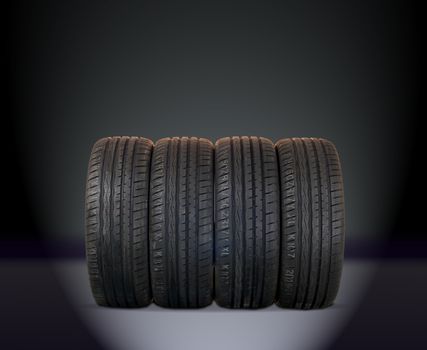 summer tires isolated on dark background