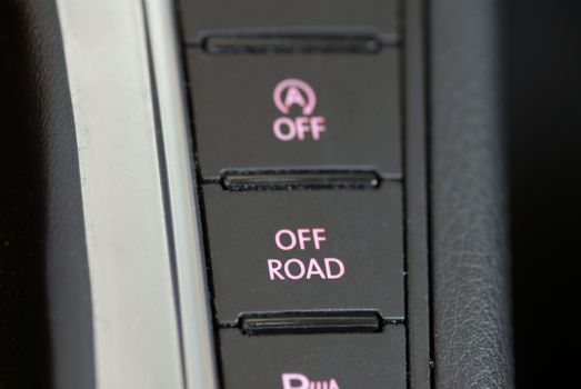 button to activate the off-road performance of the car