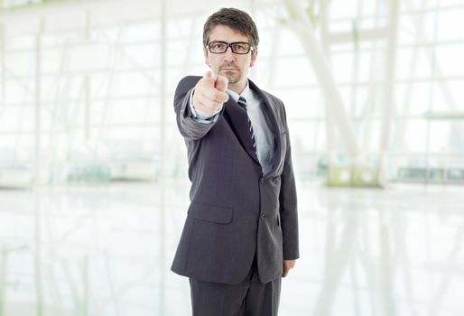 young business man pointing, at the office