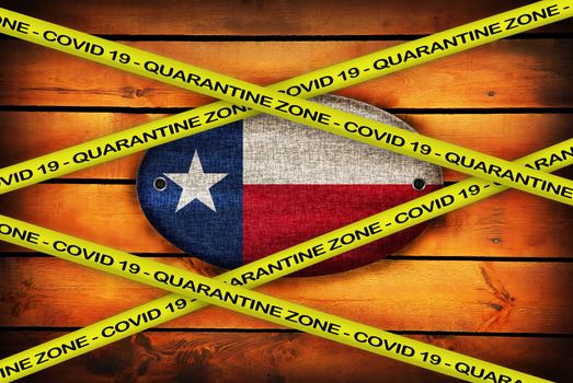 COVID-19 warning yellow ribbon written with: Quarantine zone Cover 19 on Texas flag illustration. Coronavirus danger area, quarantined country.