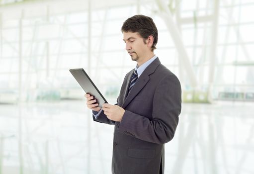 businessman using touch pad of tablet pc, at the office