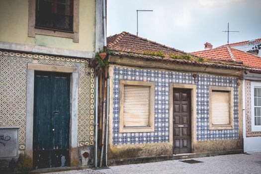 Aveiro, Portugal - May 7, 2018: Small traditional house architecture detail in the historic city center of the city on a spring day