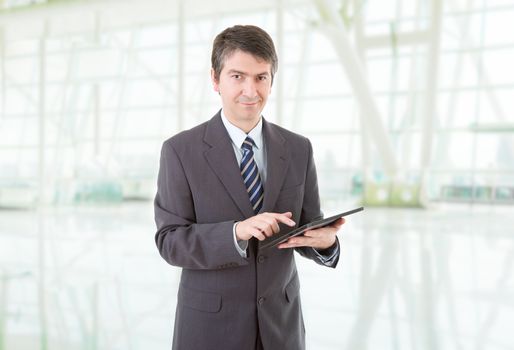 businessman using touch pad of tablet pc, at the office