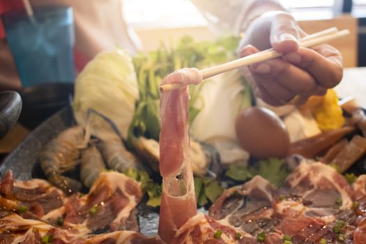 Slice of beef for hot pot in japanese restaurant