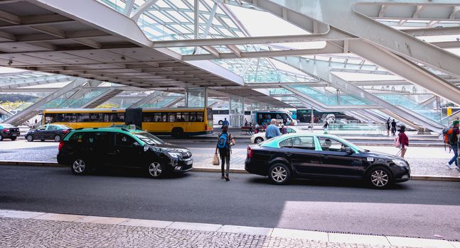 Lisbon, Portugal - May 7, 2018: Taxis cars parked in front of Oriente Intermodal Station Lisbon, a railway and road station completed in 1998 for Expo 98