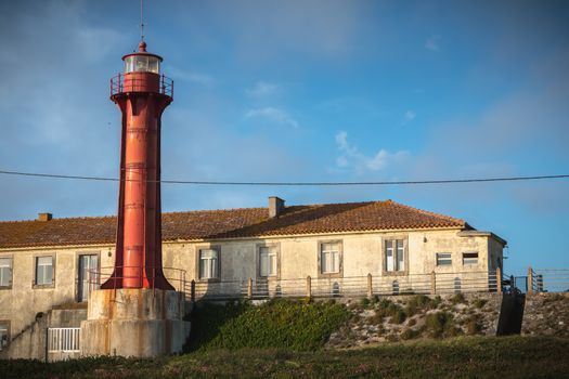 Esposende, Portugal - May 8, 2018: Architectural detail of the Esposende lighthouse near Sao Joao Baptista Fort by the sea on a spring day