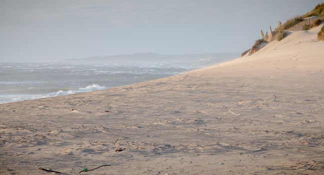 idyllic beach of fine sand in Portugal in the evening