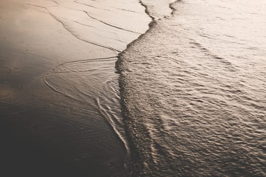 Tropical nature clean beach and white sand in summer season with dark color tone abstract  background.