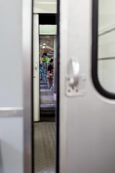 The door of the train is not completely closed.