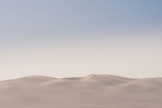 View of the Skeleton Coast desert dunes in the morning in Namibia in Africa.
