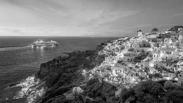 Great twilight view of Santorini island. Sunset on the famous Oia city, Greece, Europe