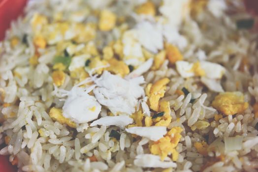 Crab meat fried rice is seafood for sale at Thai street food market or restaurant in Bangkok Thailand