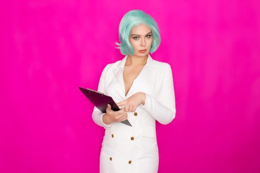 Beautiful young woman with short blue hair in a white business dress jacket holding a black folder with documents