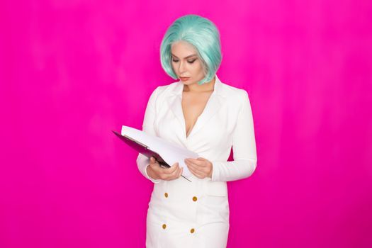 Beautiful young woman with short blue hair in a white business dress jacket holding a black folder with documents