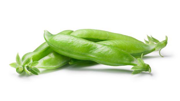 Pile of green sugar Pea (Pisum sativum) pods. Clipping paths, shadows separated