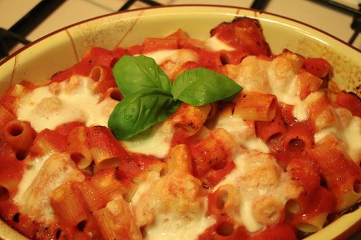 baked pasta with tomato and fresh basil