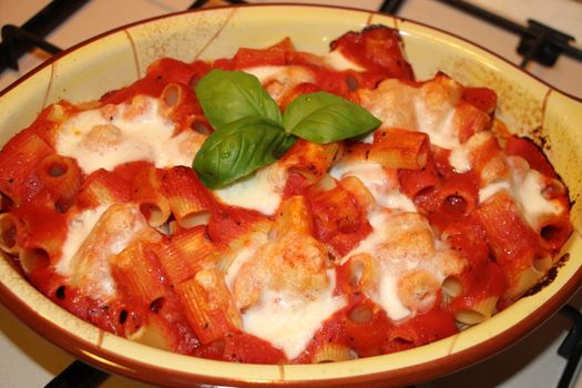 baked pasta with tomato and fresh basil