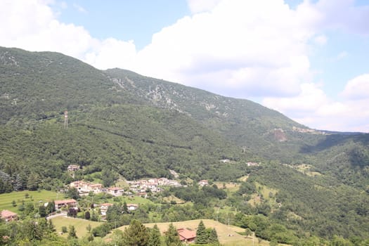 view of a small village in the mountains in northern Italy