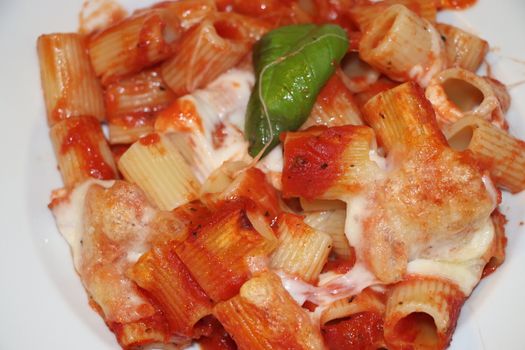 baked pasta with tomato and fresh basil