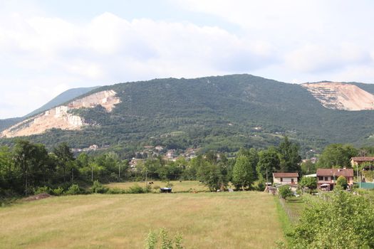 landscape with meadow and mountains in northern Italy