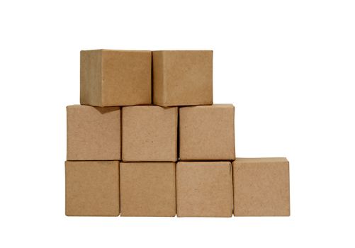 Stack of cardboard cubes on white background isolated with clipping path