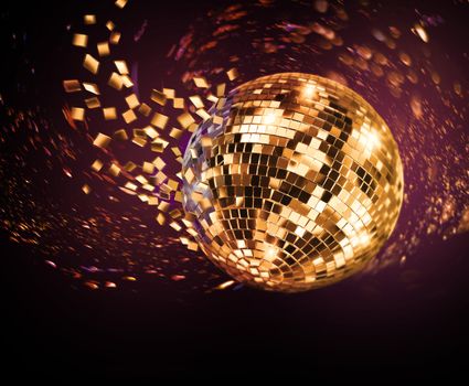 Vintage disco mirror ball spinning and breaking into purple and golden flying glass fragments on dark background