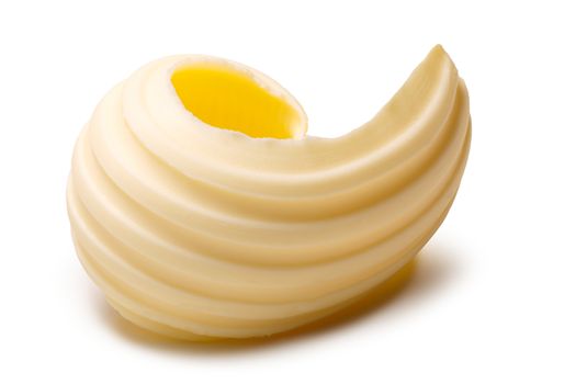 Butter curl or roll. Clipping paths, shadow separated