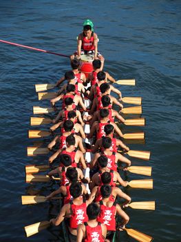 KAOHSIUNG, TAIWAN - JUNE 11: The Science University  team is ready to compete in the 2013 Dragon Boat Races on the Love River on June 11, 2013 in Kaohsiung