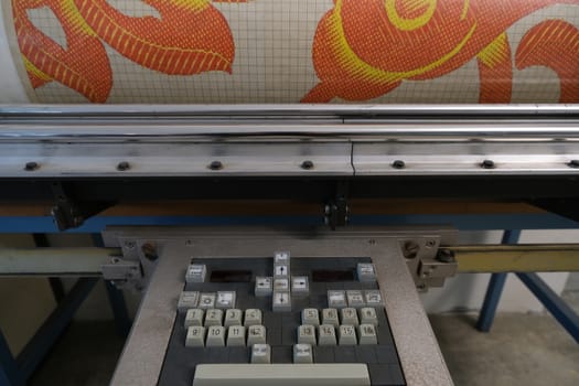 Busto Arsizio, Lombardy, about september 2019. Old drum scanner used to digitize fabric designs complete with control keypad.