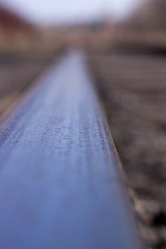 Long rails close-up. Railway. The wooden sleepers.