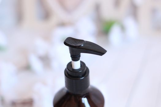 Transparent brown Bottles for Shampoo, Soap or other cosmetic on white background.