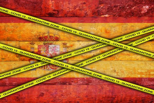 COVID-19 warning yellow ribbon written with: Quarantine zone Cover 19 on Spain flag illustration. Coronavirus danger area, quarantined country.