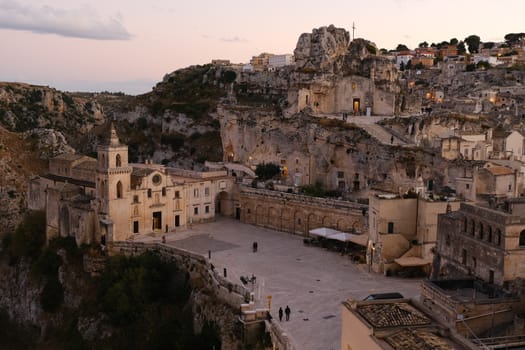 Church of San Pietro Caveoso in Matera. Above, the Rock Church of Santa Maria di Idris. View at sunset.
