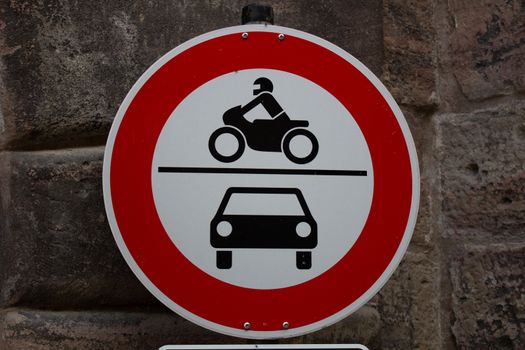 Old fashioned Traffic sign No motor vehicles cars and motorbikes in red, white and black