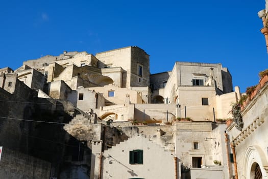 Houses built with blocks of tufa stone in the ancient Mediterranean city of Matera in Italy.