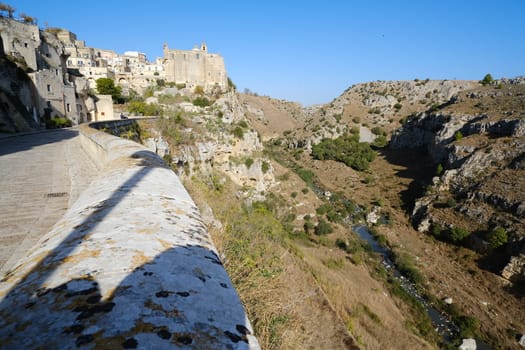 View of the city of Matera in Basilicata and the Gravina stream. During the rains the stream collects the waters that fall copious.