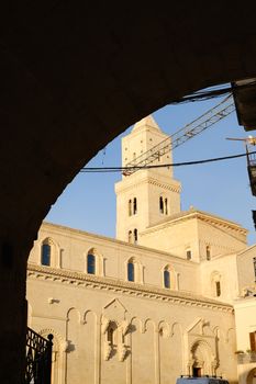  Cathedral Church of the Madonna della Bruna and of Sant'Eustachio in Matera. Built in tuff stone. Sunset light.
