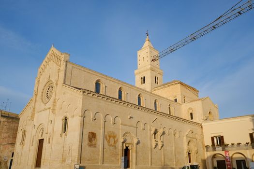 Matera, Basilicata, Italy. About 11/2019. Cathedral Church of the Madonna della Bruna and of Sant'Eustachio in Matera. Built in tuff stone. Sunset light.
