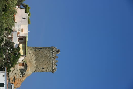 Forio, Ischia, Naples, Italy, About the July 2019. Ancient defensive tower in Forio, on the island of Ischia. The towers served as sighting points for enemies arriving from the sea.