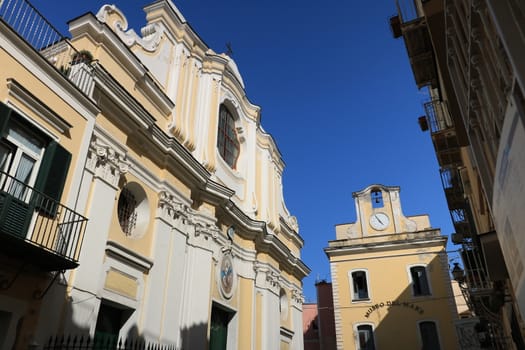 Ischia, Naples, Italy, About the July 2019. Museum of the sea and church in the small Mediterranean village of Ischia Ponte. Blue sky background.